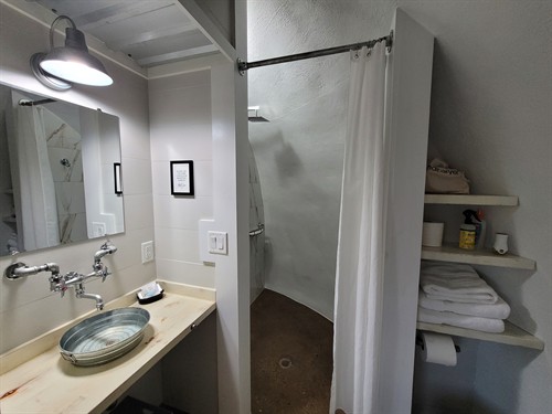 A spacious 26 sq. ft. walk-in shower in every suite.