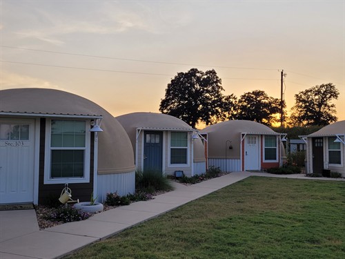 Evenings at Country Dome Suites — quiet, unplugged, and glowing at sunset.
