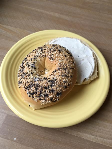 Fresh baked bagels with your choice of toppings