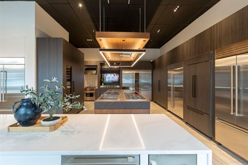 Wolf cooktop and refrigeration display at Designer Appliances