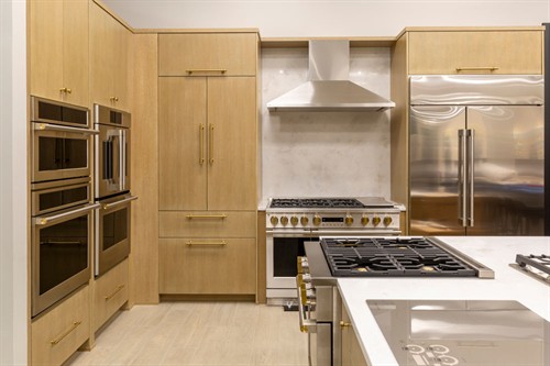 Monogram wall oven, range, dishwasher and refrigerator display at Designer Appliances