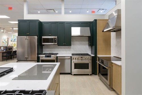 GE Cafe range, wall oven, refrigerator and dishwasher display at Designer Appliances