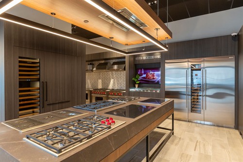 Wolf cooktop and refrigeration display at Designer Appliances