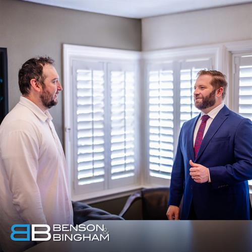 In the Downtown Las Vegas office of Benson & Bingham, attorneys Jordan Kingsley and Tye Masters exchange insights to strengthen client cases.