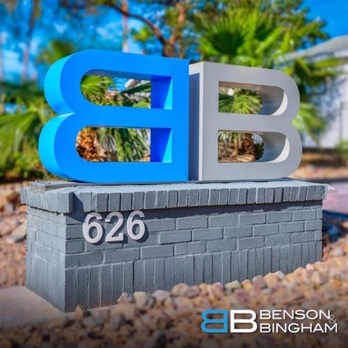 Just outside the office, the Benson & Bingham Law Firm sign welcomes visitors arriving for guidance on personal injury and accident cases.