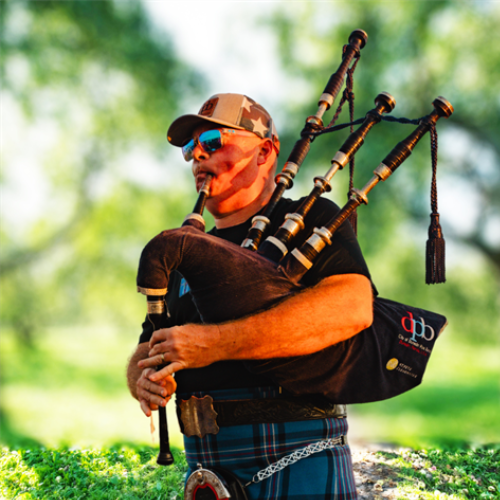 Bagpipes at sunset — a living tribute to Dunedin’s Scottish roots.