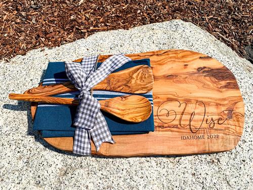 This personalized olvie wood cutting board set is our most popular single gift that leaves the shop. Olvie wood is amazing for its antimicrobial properties! It is also a stunning piece to have in your home. 