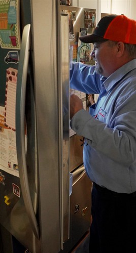 Gallery Image Mr._Appliance_of_Spokane_Valley_Servicing_a_Refrigerator_in_Medical_Lake.jpg
