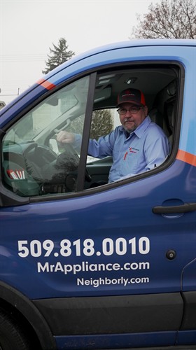 Gallery Image Robert_Harris_in_the_Mr._Appliance_of_Spokane_Valley_Van_supporting_Veterans_in_Fairchild_Air_Force_Base.jpg