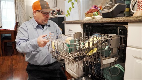 Gallery Image Robert_Harris_of_Mr_Appliance_of_Spokane_Valley_Repairing_a_Dishwasher.jpg