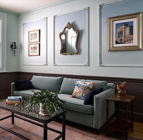 An intimate living room design embracing the history of the 1800d's row house