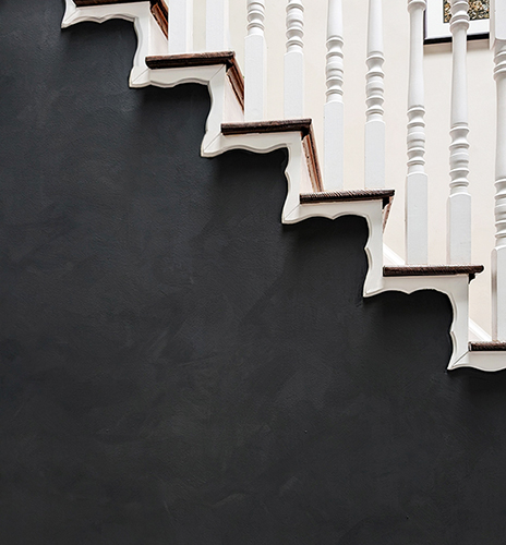 Black limewash interior wall - zero VOC, performs well over time, artistic results