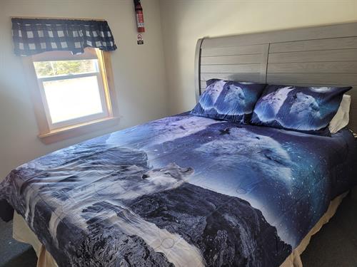 Wolf Den bedroom with queen bed