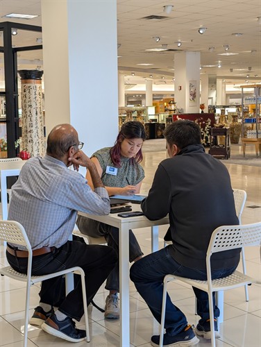 Energy Efficiency Specialist meets with a business owner