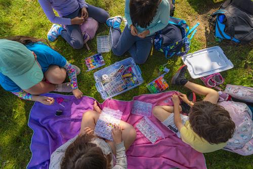 Gallery Image Friendship_Bracelets_Aerial_View_Group_Photo.jpg