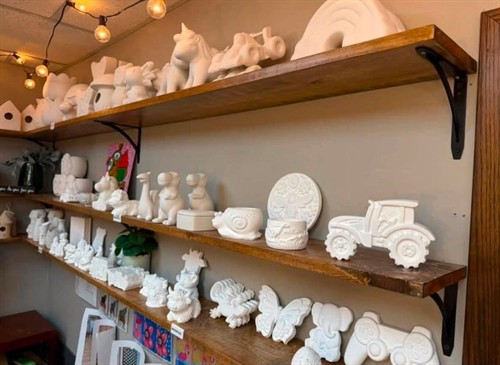 Large selection of indoor resin and plaster pottery 