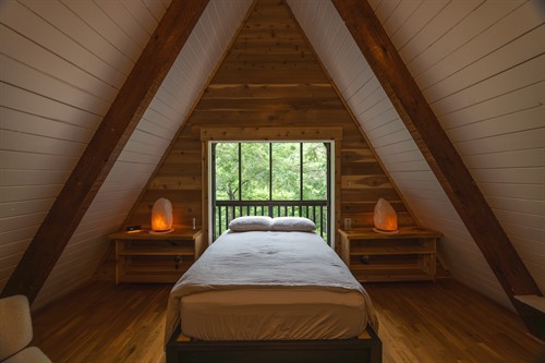 Our favorite bedroom features an award-winning Helix mattress, custom-engineered to slide onto the balcony. Drift to sleep beneath the stars—guests have spotted shooting stars and even bald eagles from the comfort of this bed.