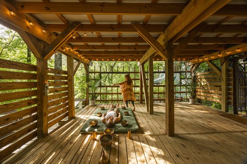 A wellness retreat like no other -- enjoy your very own yoga studio. Accompanied with yoga mats, blocks and seating areas. This space includes viewing windows to enjoy the river while you relax during your wellness experience.