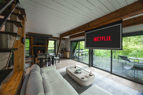 A beautifully designed living room featuring luxurious textures, curated Native American artifacts, and our 30-inch authentic Chinese gong — a centerpiece of calm that resonates through the retreat.