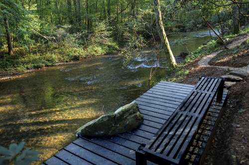 View of the Toccoa River from one of the stone walking baths in the back yard of the retreat.