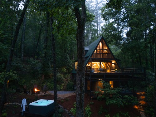 Aerial view of the retreat’s backyard during on a moody summer twilight evening.