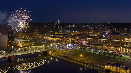 Drone Aerial View Downtown Stillwater Twinkle Party Winter Fireworks view more at https://picturesoverstillwater.com/chamber