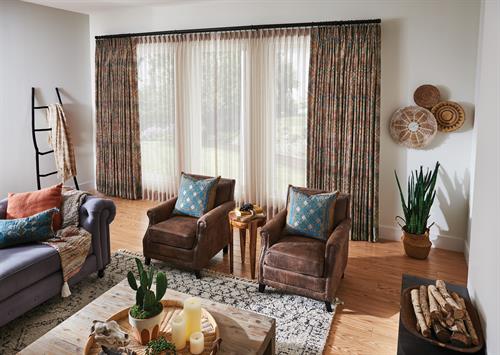 Layered draperies soften a room while allowing for both light and privacy.