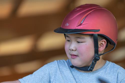 Client in Therapeutic Riding Program