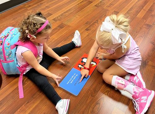 All Ears! Center children learn to listen, talk and read.