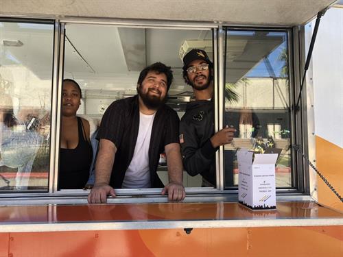 Youth helping at Angel Reach Food Truck