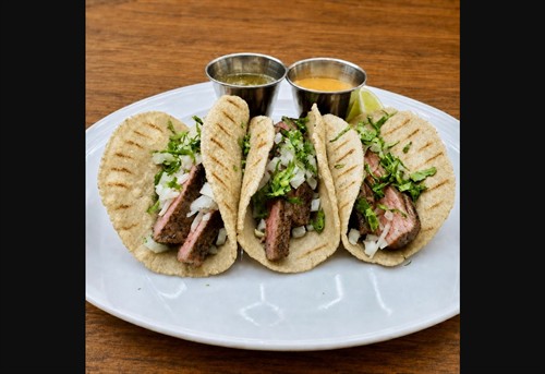 Steak Tacos. Grass fed flank steak with onion, cilantro and sauces. EAT THIS Fast & Fresh in The Woodlands.