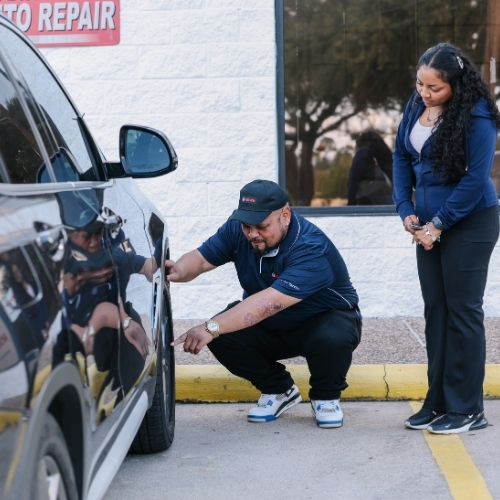 Bosch Auto Service North Houston service advisor performing an after service inspection.