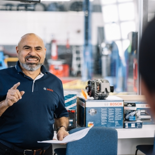 Owner Nelson Ramos helping a customer.