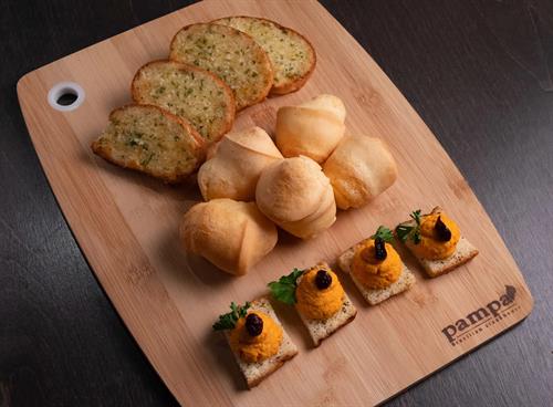 Cheese Bread (Pão de Queijo) - Traditional Brazilian cheese bread, golden on the outside, soft and cheesy on the inside