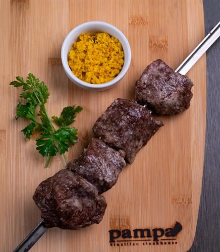 Petite tender garlic steak - Extremely tender cut rubbed with fresh minced garlic.