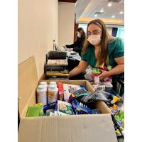 St. Mary Medical Center’s Give Back Committee packs donations for soldiers