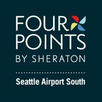 Four Points ribbon cutting