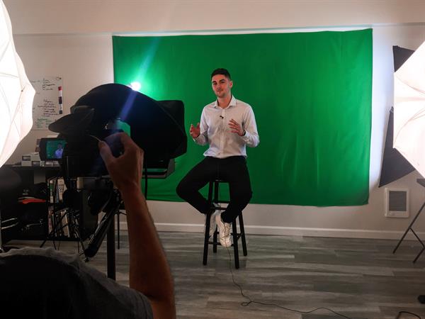 Ethan filming our Lean White Belt video series.
