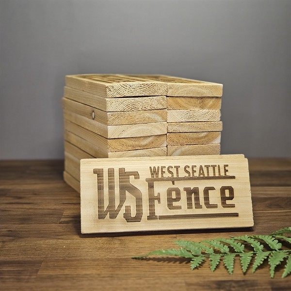 Custom engraved wood signs for WS Fence, installed on completed fences as a lasting mark of their craftsmanship.