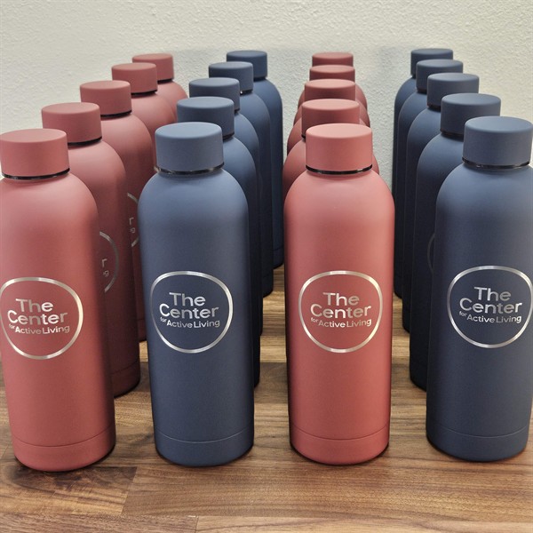 Custom engraved water bottles in assorted colors, created for a nonprofit to sell as branded merchandise within their community.