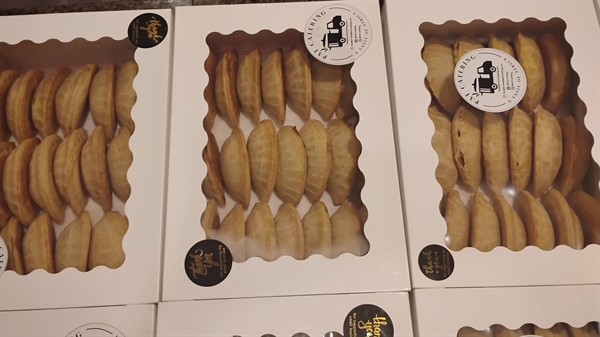 Meat Pies – Handheld savory pastries filled with seasoned beef, carrots and potatoes.