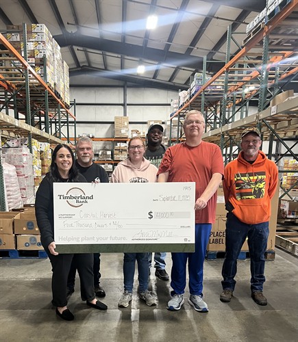 Coastal Harvest donation check presentation 