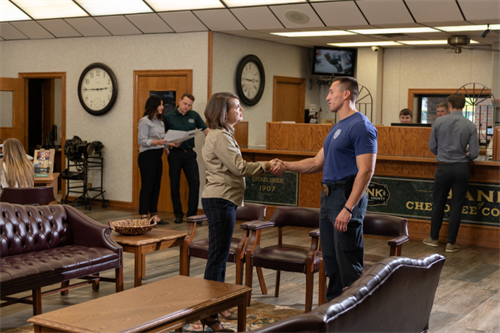 CEO Susan Plumb of Bank of Cherokee County shaking hands with a customer at BOCC in Tahlequah Oklahoma. CEO Susan Plumb of Bank of Cherokee County shaking hands with a customer at BOCC in Tahlequah Oklahoma.