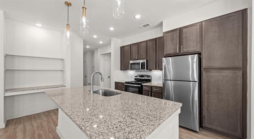 Our kitchens have plenty of cabinet space and storage.