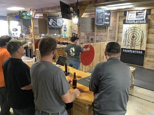 Axe throwing league night—competitive fun and returning players every week