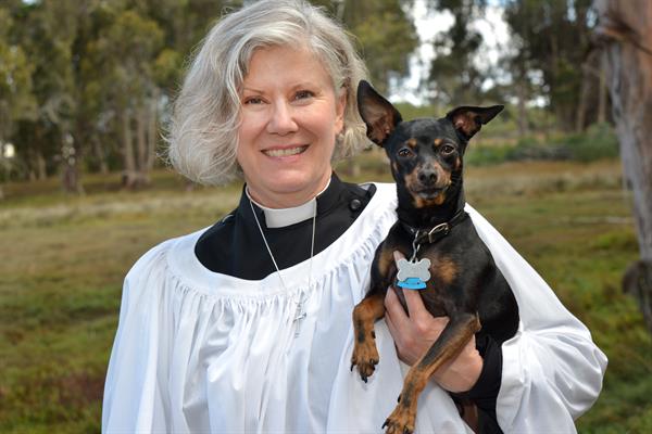 Priest-in-charge, Reverand Sturgess and her companion