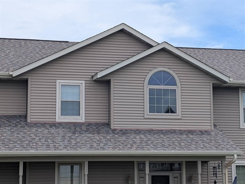 Beautiful Weathered Wood  Landmark Pro shingles were installed on this New Glarus home. 