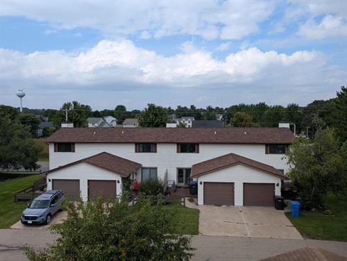 Burnt Sienna shingles add rich color and lasting protection to this Verona property.