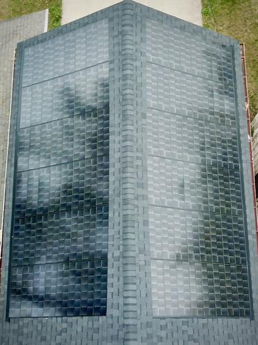 Sun Vault Roofing transformed this property with a solar shingle system designed to reduce utility costs and provide sustainable power for decades.