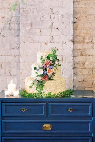Gallery Image 3-tier_Signature_Cake_with_floral_cascade.JPG